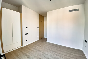 A Bright and Minimalist Interior Space Showcasing a Modern Design with Clean Lines and Soft Color Palette Ideal for Various Uses