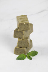 Vegan Green tea matcha candy. White background. Close-up