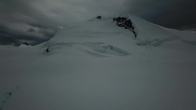 Antarctica Winter Mountains Coastal Scenery, Dramatic Clouds and Sky in Cold Dark Blue Landscape with Glaciers and Ocean Sea Water on Coast, Antarctic Peninsula Seascape in Moody Atmospheric Scene