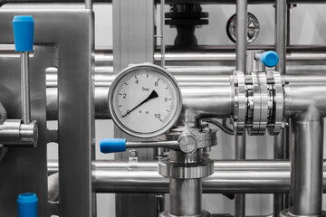 Food production machine with stainless steel pipes, cooling radiator as separator and tanks, valves and measuring instruments