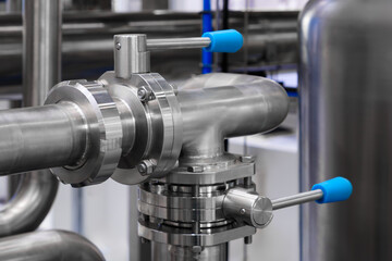 Food production machine with stainless steel pipes, cooling radiator as separator and tanks, valves and measuring instruments