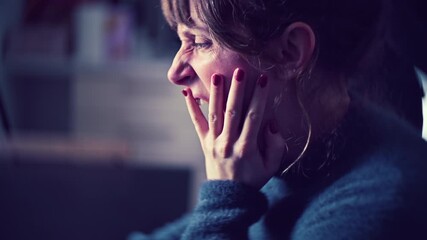 woman just woke up working from home and yawning in front of the computer rubbing her eyes - Powered by Adobe