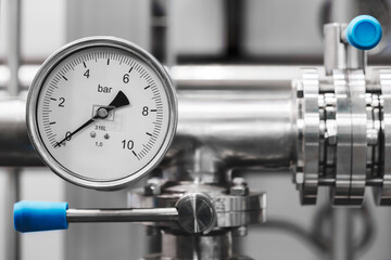 Food production machine with stainless steel pipes, cooling radiator as separator and tanks, valves and measuring instruments