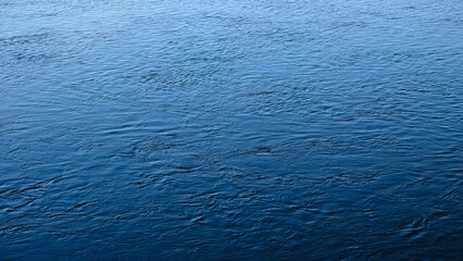 The river's flowing water is a deep blue, without ripples or waves. It's calm and soothing, creating an atmosphere of serenity like the blue background.