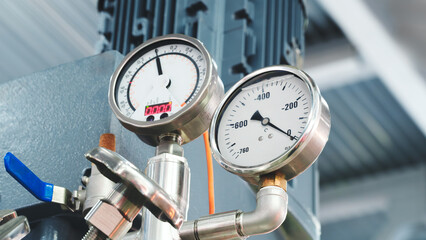 Food production machine with stainless steel pipes, cooling radiator as separator and tanks, valves and measuring instruments.