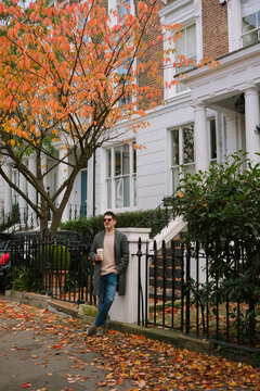  Man autumn street in London