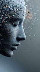 Dramatic side profile of human face dissolving into abstract shapes