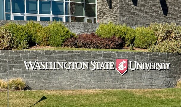 Pullman, WA - USA - October 5, 2025 - Exterior sign at the entrance to Washington State University in Pullman - home to the Cougars