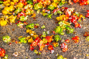 Colorful Popcorn Spilled on the Ground A Sweet Mess on the Pavement