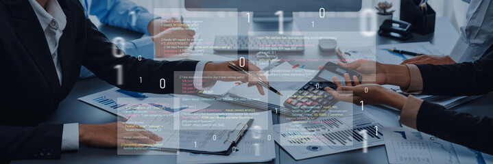Professionals engage in a business meeting, discussing statistics and technology, with data overlays enhancing the analysis in a modern office environment. Trope