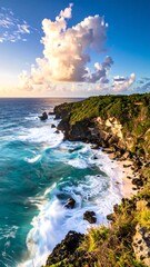 Dramatic coastal scenery at sunset.  Ocean waves crash against a rocky shore, beneath a vibrant sky