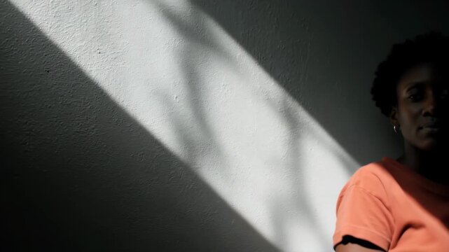 minimalistic portrait emphasizing human rights featuring subject with serene expression against clean background