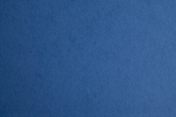 Blue paper texture background closeup
