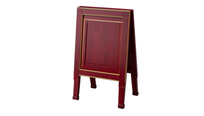 A red wooden easel-style sign with gold trim stands against a black background