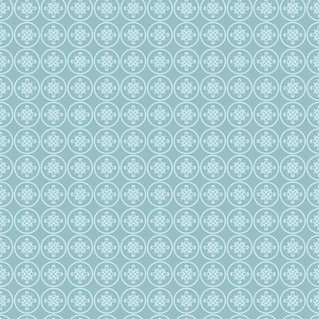 Geometric patterned background with circular shapes in soft blue tones design