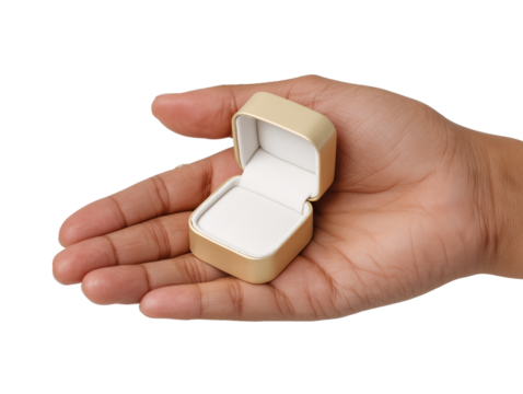 Hand holding open jewelry box