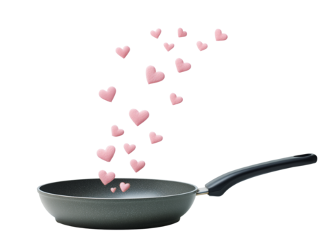 Frying pan releasing floating pink hearts