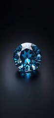 A single blue diamond shining in the darkness, illuminated by studio lighting