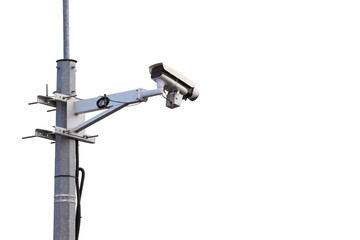 Obraz premium An Outdoor CCTV Security Camera On A Metal Pole, Isolated On A White Background. Urban Surveillance And Safety Technology.