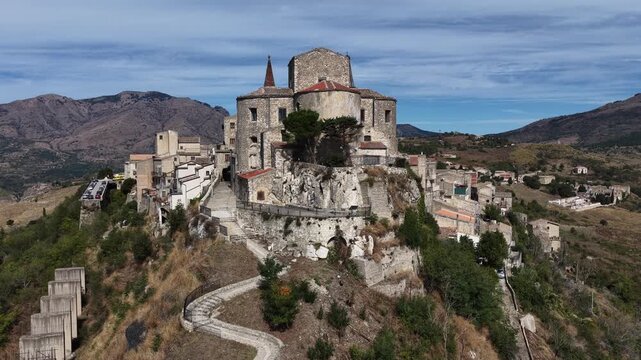 Aerial drone view of Petralia Soprana, a historic Sicilian mountain town with panoramic views of the Madonie Mountains,Petralia Soprana famous Church of Saint Mary of Loreto, Sicily, Italy