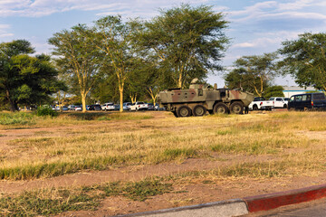 Fototapeta premium military vehicle, rebels and government army in an african country, street warfare 8×8 Light Armored Tactical Vehicle ,