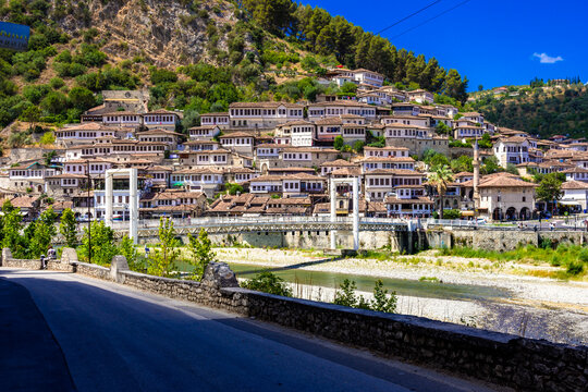 Historical Ottoman Houses in neighborhoods Gorica and Mangalem in Berat, with bridges over river Osum, Albania.