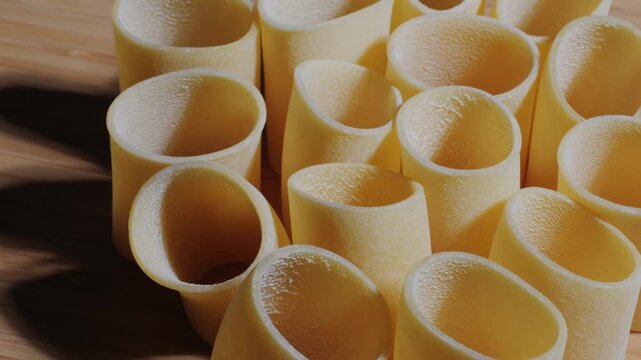 Italian pasta Paccheri, Cannelloni type of pasta in the shape of a very large tube, originating from Campania