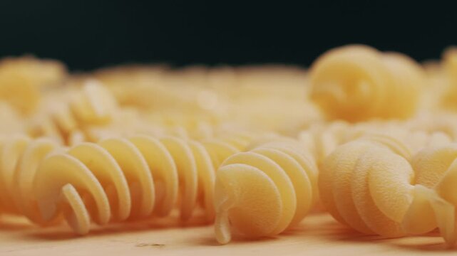Pasta mix, different Italian tagliatelle fussili pasta packaging window, Fettuccine pasta, close up, not cooked