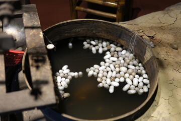 traditional silk production process carefully create silk fabric from start to finish. From spinning fine silk threads to weaving on wooden looms, this handmade craft reflects cultural heritage, skill