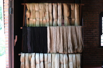traditional silk production process carefully create silk fabric from start to finish. From spinning fine silk threads to weaving on wooden looms, this handmade craft reflects cultural heritage, skill