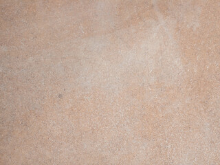 Light brown stone textured background with subtle natural patterns