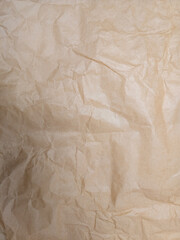 Wrinkled brown kraft paper texture background for design