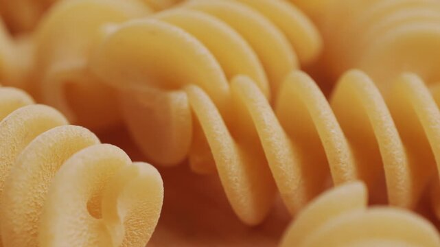 Pasta mix, different Italian tagliatelle fussili pasta packaging window, Fettuccine pasta, close up, not cooked