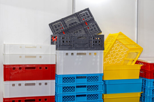 Stacked Colourful Plastic Crates for Packaging Fruits and Vegetables Agriculture Farming