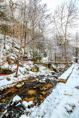 Landscape of the Escouloubres valley under the snow, in the Pyrenees in France