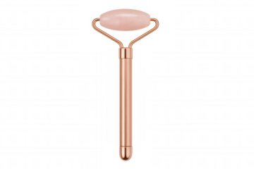 Rose quartz face roller on transparent background, promoting skin care, beauty, massage, and wellness