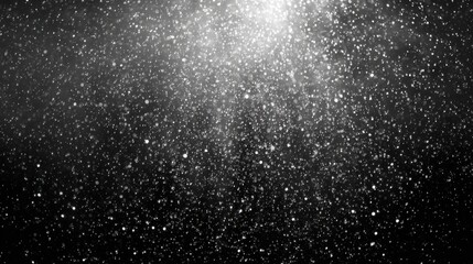 Glistening particles float in the air against a deep black background forming a dreamy scene. This stunning display captures the essence of a serene and mysterious night environment.