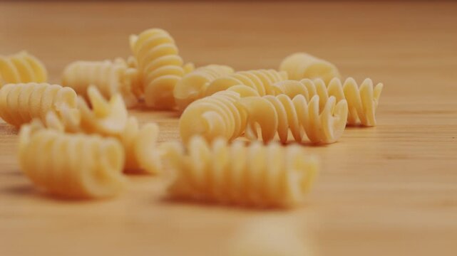 Pasta mix, different Italian tagliatelle fussili pasta packaging window, Fettuccine pasta, close up, not cooked