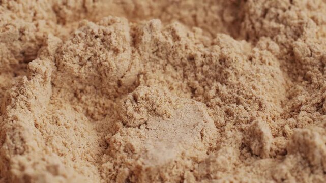 Ashwagandha Indian Ginseng Powder in White Bowl isolated on white background, superfood close up. 