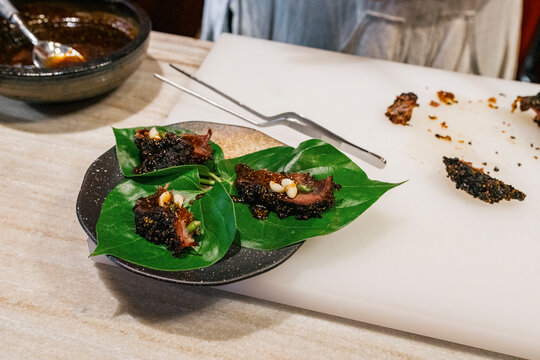 Thai Northern dish Miang Nua (spicy beef wrapped in leaves)