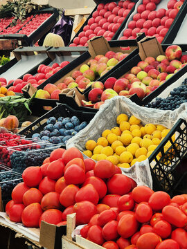 Colorful display of fresh fruits at a market stand