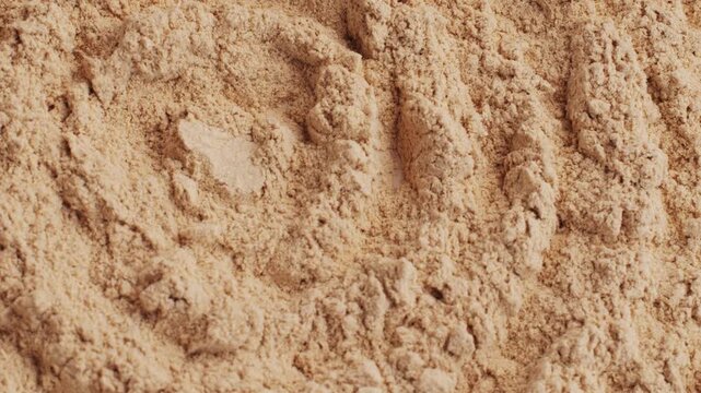 Ashwagandha Indian Ginseng Powder in White Bowl isolated on white background, superfood close up. 