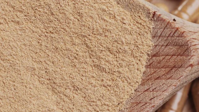 Ashwagandha Indian Ginseng Powder in White Bowl isolated on white background, superfood close up. 