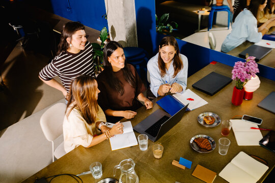 Overhead shot of a coworking office with a collaborative atmosphere