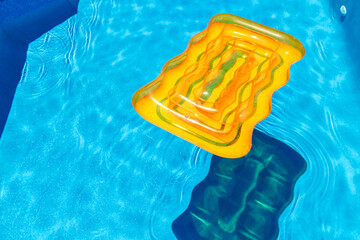 Colourful Pool Floats In Pool