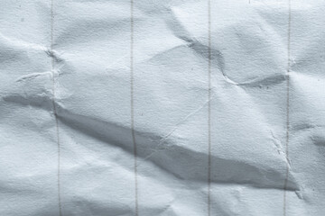Textured Crumpled Sheet of White Paper with Vertical Lines Creating an Interesting Background for...