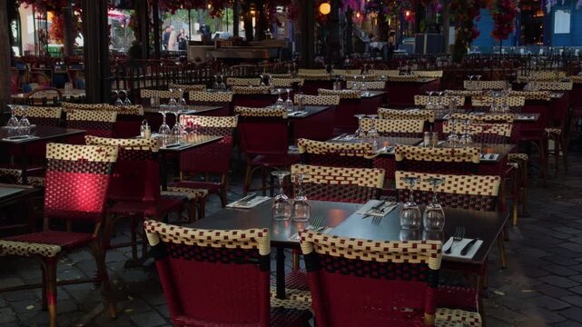 Charming and Elegant Outdoor Restaurant Setting Featuring Tables and Chairs in a Beautiful Atmosphere