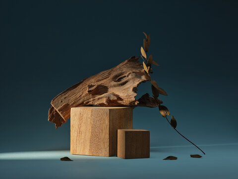Wooden elements, leaves, and cubes on blue background create a natural