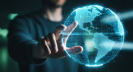 Man with his hand touching a glowing digital globe. Global technology, network connection and communication concept for business data exchange.