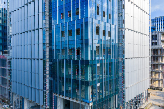 Close-up view of unfinished office building under construction